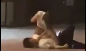 Girlfriend punches boyfriend while choking him