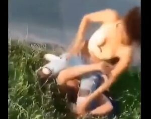 Small girl fights a bigger girl and wins