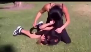 Girl Fight Facesitting – Girl spit on another girl in a street fight