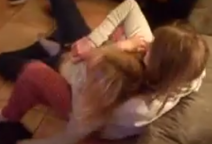 Girl taps out a boy