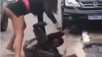 woman beat up a man