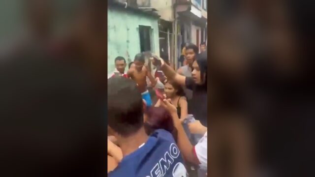 Crowd Girl Fight Breaks Out at a Street Party